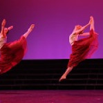 2 girls jumping
